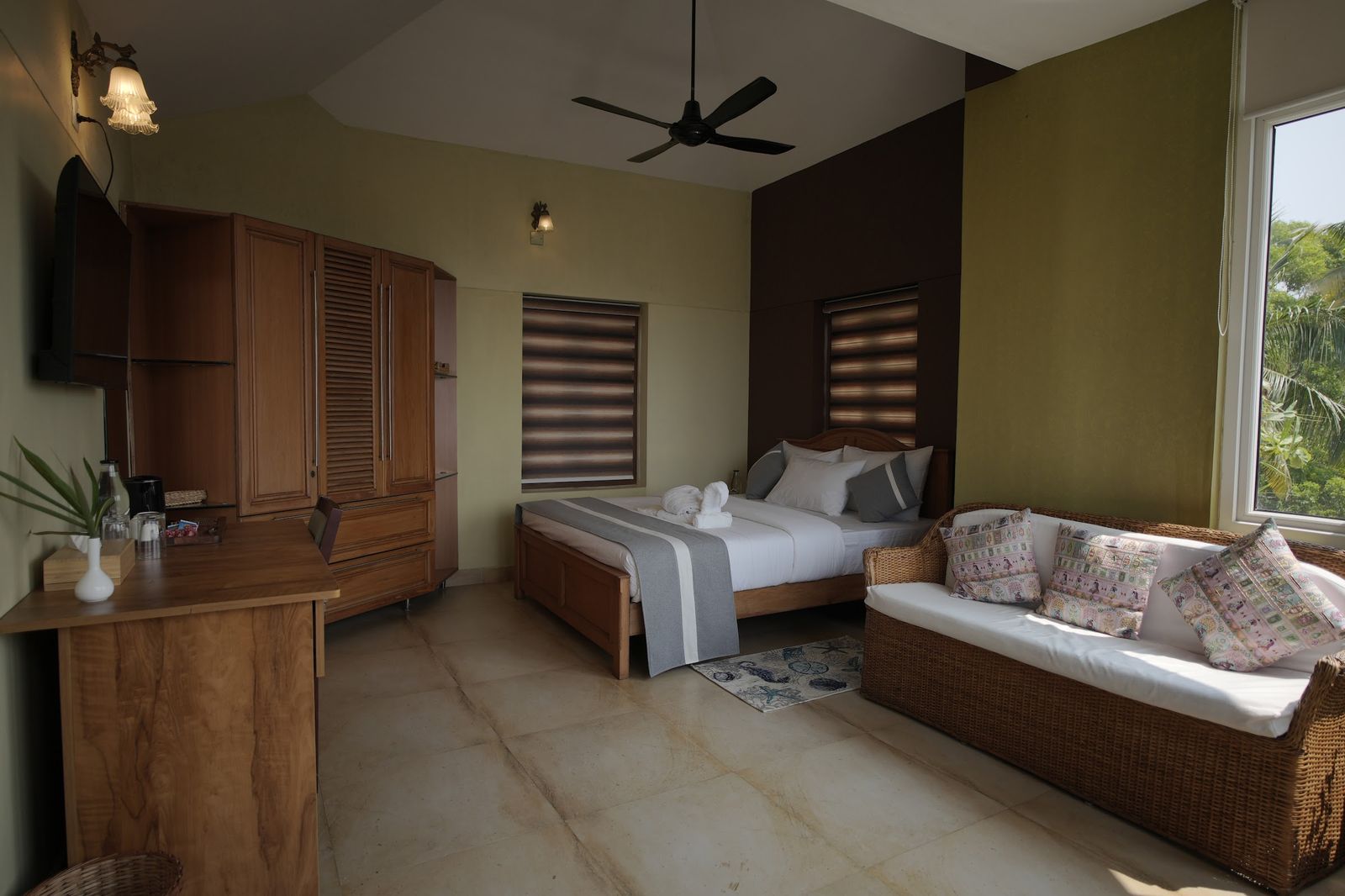 The bed and sitting area of the Horizon Sky Suite